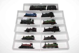 Eleven assorted locomotive train models.