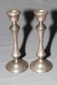 Pair silver loaded candlesticks, 26cm, Birmingham 1976.