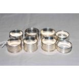 Collection of eight silver napkin rings.