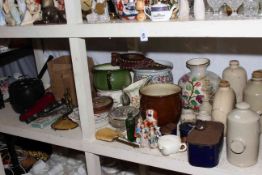 Stoneware bottles, planters, enamel tin, figurines, child's chair, trunk with contents.