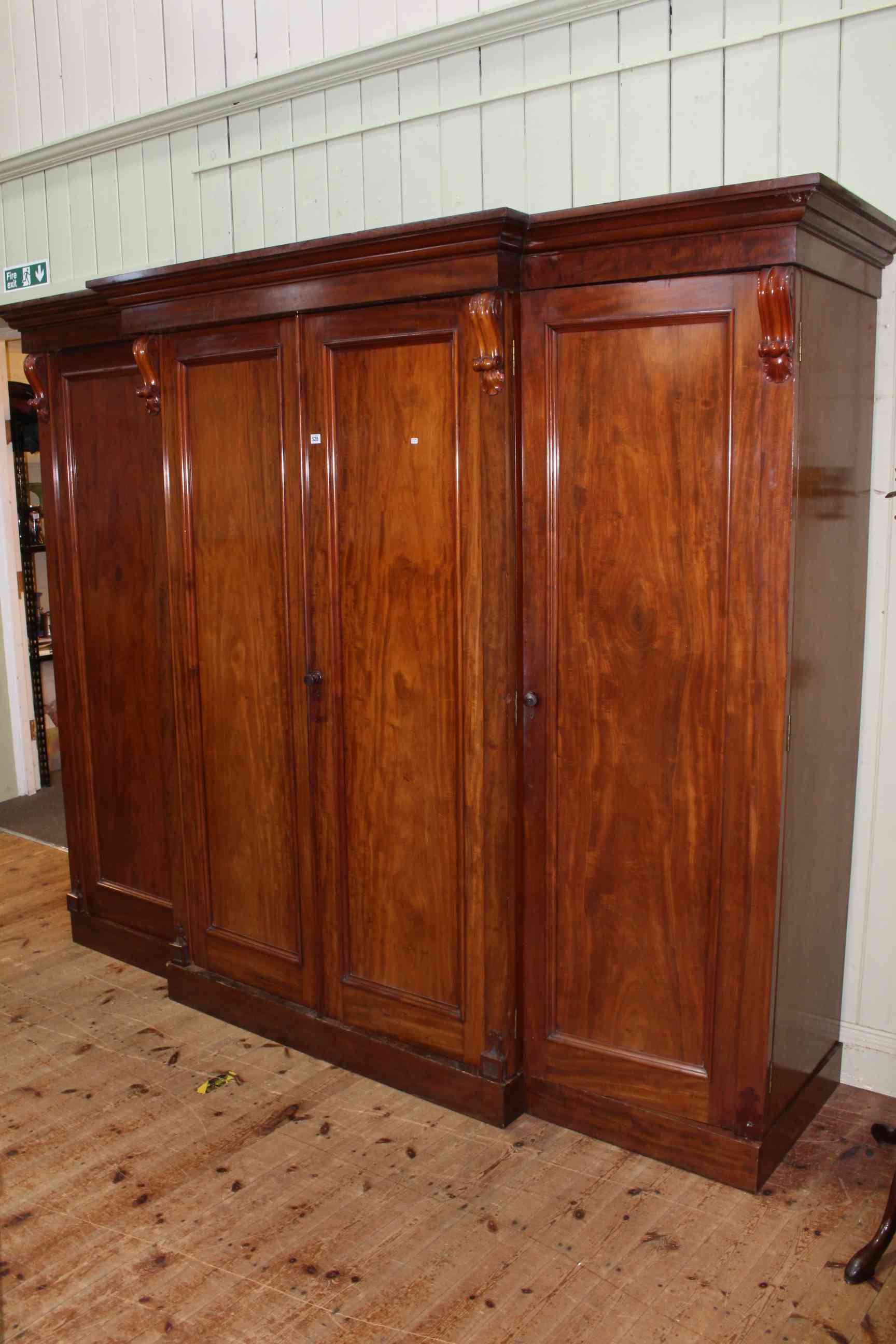 Victorian mahogany four door breakfront fitted wardrobe, 213cm x 261cm x 67cm.