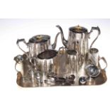 Four piece silver plated tea set, silver spill vase and pair pepperettes, silver and other spoons,