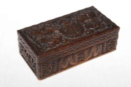 Carved wood box decorated with dragons and monogram, 20cm across.