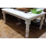 White washed farmhouse style kitchen table on turned legs, 79cm x 179cm x 105cm.