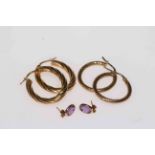 Three pair of 9 carat gold earrings including amethyst pair.