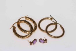 Three pair of 9 carat gold earrings including amethyst pair.