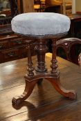 Victorian walnut revolving piano stool.