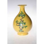 Chinese yellow glazed vase with fruit decoration on dragon incised background, six character mark,