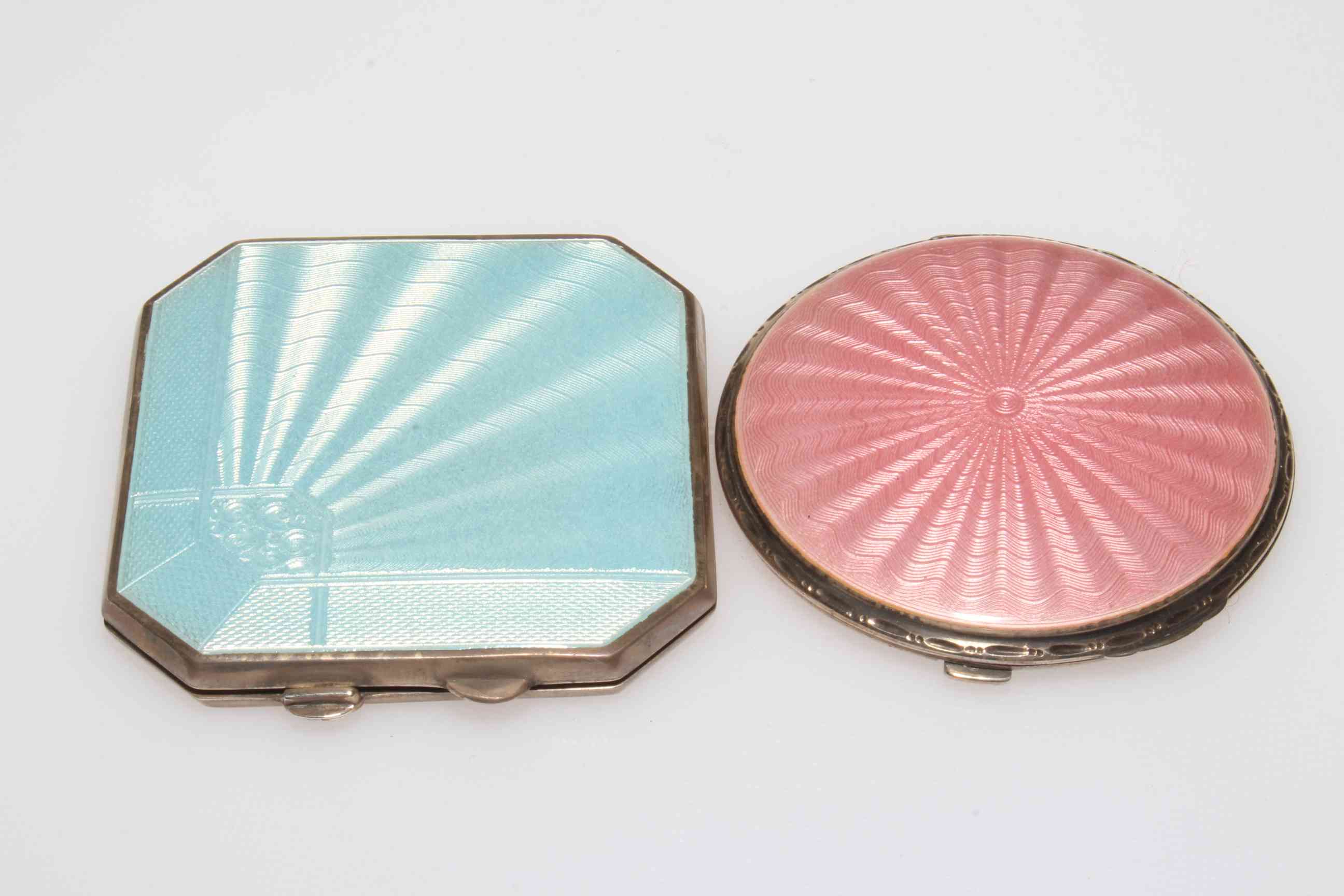 Two silver and enamel compacts, pale blue square form Birmingham 1937, 6.