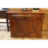 Victorian mahogany chiffonier having long drawer above two cupboard doors, 87cm by 103.5cm by 39cm.