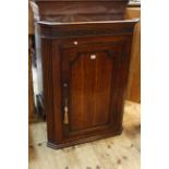 19th Century oak and mahogany fielded arched panel door corner wall cupboard, 108cm.