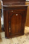 19th Century oak and mahogany fielded arched panel door corner wall cupboard, 108cm.