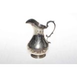 Victorian silver baluster milk jug with engraved decoration, Sheffield 1877, 14.5cm high.