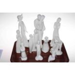 Collection of Royal Doulton and Coalport white pottery figures.