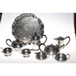 Civic pewter four piece tea service with hammered Arts & Crafts styling,