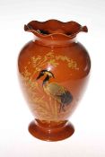 Linthorpe Pottery brown glazed vase, having painted decoration of heron in river-scape, shape no.