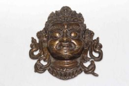 Tibetan bronze mask, 16cm across.