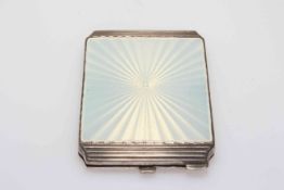 Mappin & Webb silver and enamel compact with guilloché white enamel and stepped sides,