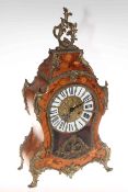 Continental inlaid walnut and gilt metal mounted mantel clock with enamel Roman numeral dial.