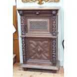 19th Century carved oak cabinet having lion mask drawer above two cupboard doors,