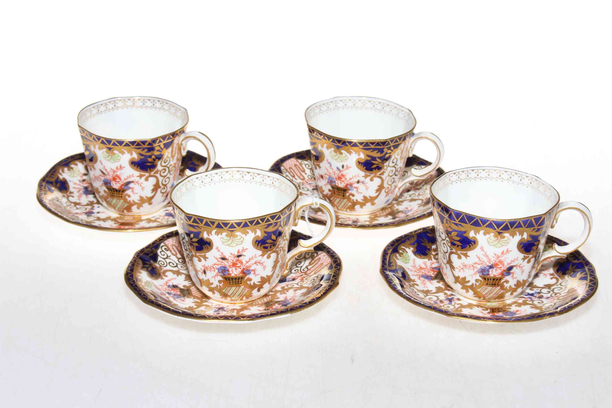 Set of four Royal Crown Derby cups and saucers.