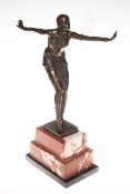 Bronze figure of Art Deco style dancing girl on marble base, 50cm high.