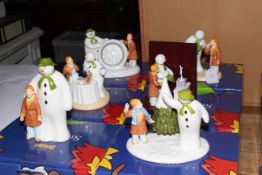 Six Coalport The Snowman figurines with boxes including mantel clock.