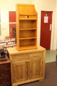 Contemporary light oak two door side cabinet and pine open bookcase (2).