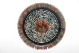Linthorpe Pottery plate with moulded band of foliage, shape no. 924, Henry Tooth monogram, 25.