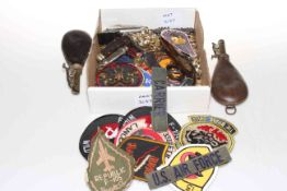 Box of collectables including powder flasks, buttons, cloth patches, etc.