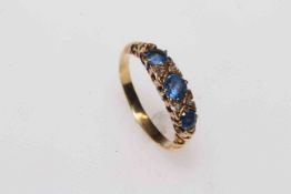 Yellow gold sapphire and diamond ring.