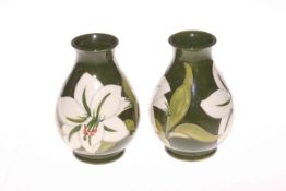 Pair Moorcroft Pottery Bermuda Green Lily pattern vases, 14cm high.