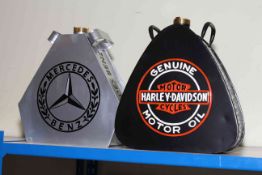 Mercedes Benz and Harley Davidson oil cans.