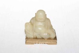 Chinese soapstone buddha on gilded base, 9.5cm across.