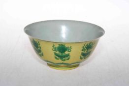 Chinese yellow and green glazed patterned bowl, blue mark to base, 17.5cm diameter.