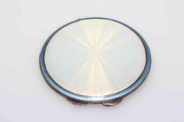 Asprey's silver and white enamel compact, with blue line border, Birmingham 1936, 7cm diameter.