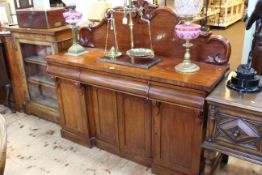Victorian mahogany chiffonier having raised crested back and three drawers with four cupboard doors