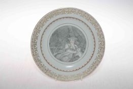 Chinese plate decorated with European lady with lamb, gilt border, 23cm diameter.