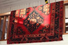 Hand knotted Persian carpet, 4.00 by 1.55m.