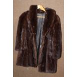 Mink fur coat, size 14 approximately.
