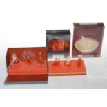 Collection of three boxed Lalique perfumes and Lalique Le Baiser soap (4).