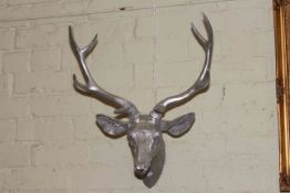 Silvered antlered deer head.