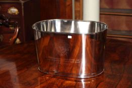 Large silvered metal rectangular champagne ice bucket, 26cm high by 43cm wide.