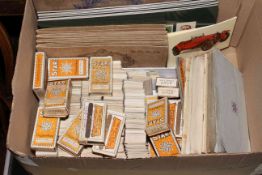 Box of cigarette cards, loose and in albums including Carreras, Ogdens, Wills, Players, etc.