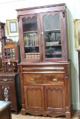 Victorian mahogany secretaire bookcase having two glazed panel doors above a long drawer with a
