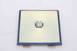 Asprey's silver and enamel compact, set with opal on white ground with blue border, Birmingham 1947,