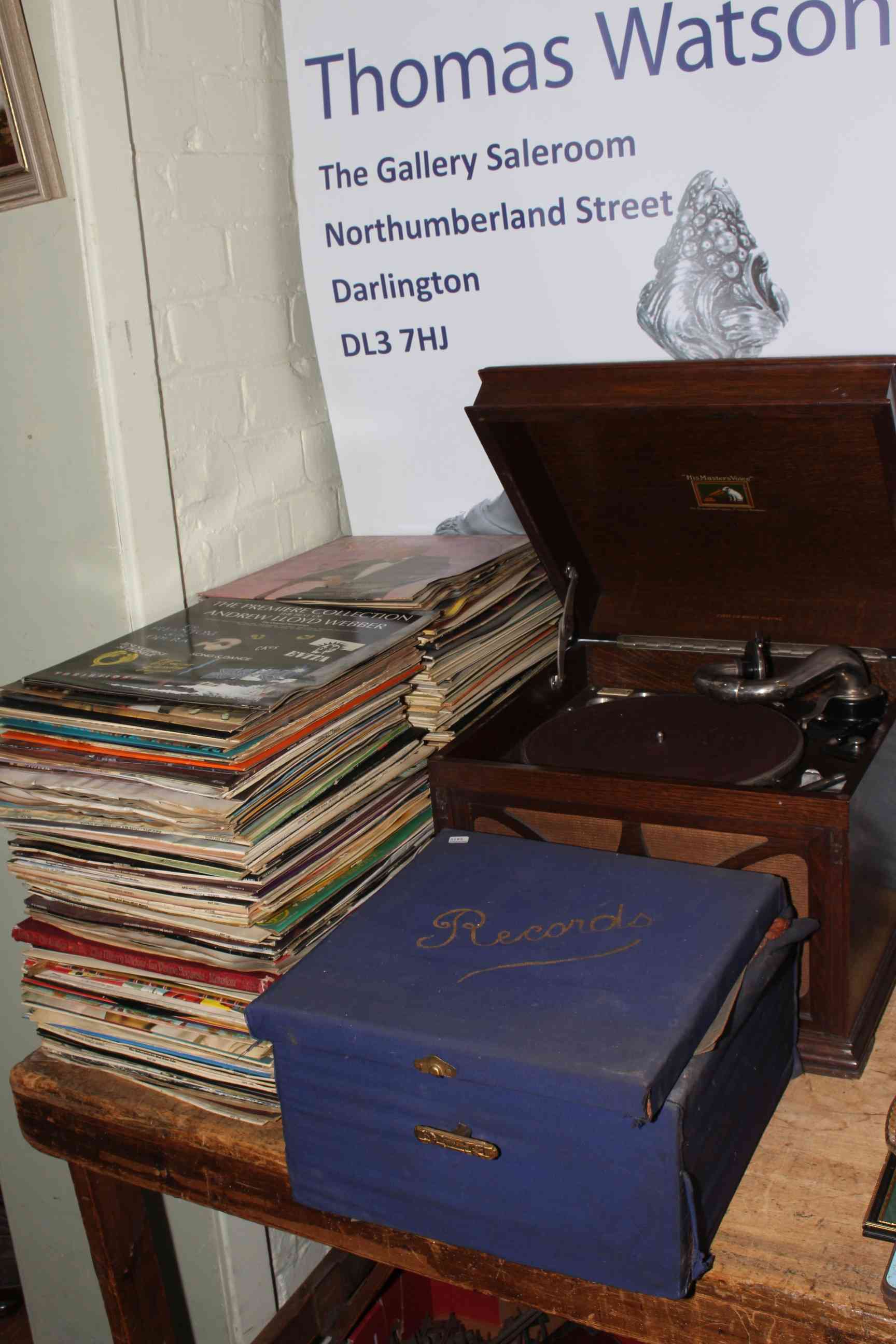 HMV table top gramophone and a collection of LP and 78rpm records.