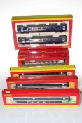 Eight assorted Hornby railway carriages.