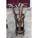 Circular oak barley twist stick stand and collection of walking sticks (stick stand 62cm by 33cm