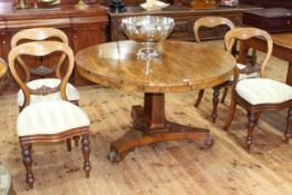 Victorian circular rosewood loo table on hexagonal pedestal to inverted triform base,